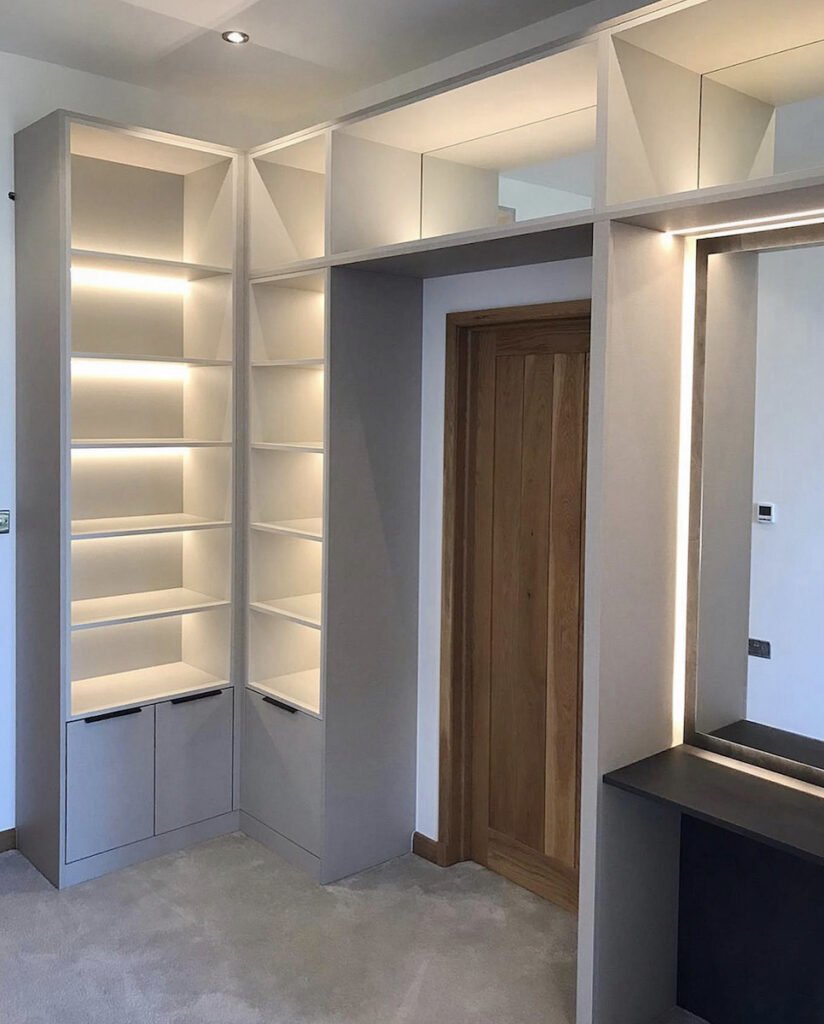Image shows bespoke dressing room with Talpa cabinetry and shelving framed in Langham Beige Silk